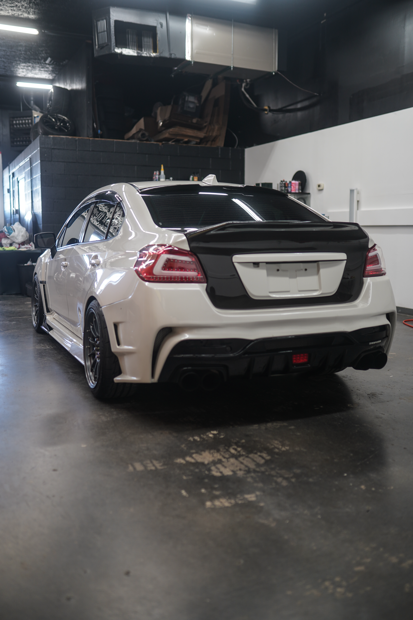 JDMuscle [15-21 WRX/STI] Gloss Black / Paint Matched License Plate Backing