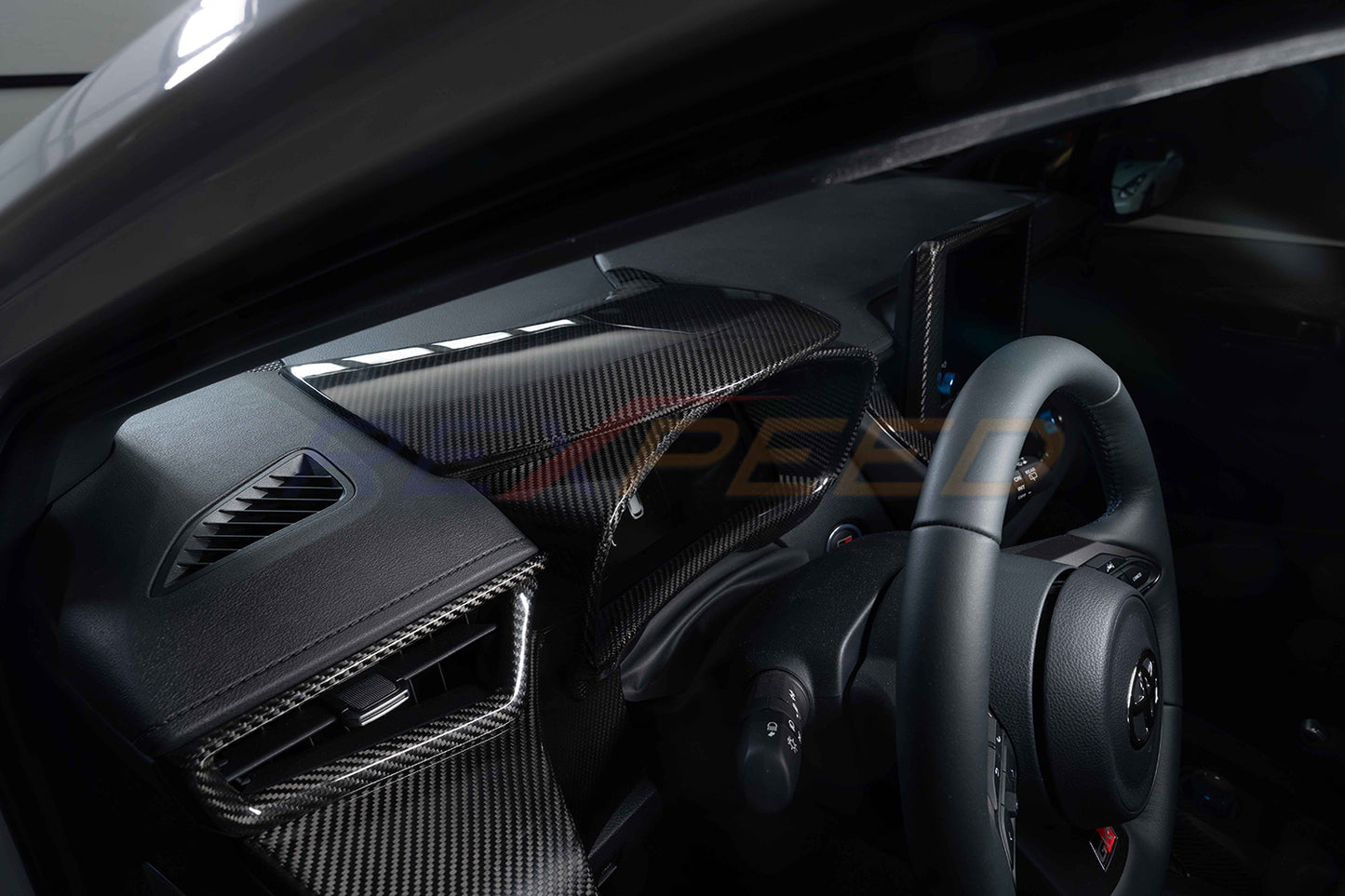 Rexpeed - 2023+ GR Corolla Dry Carbon Dashboard Frame Cover