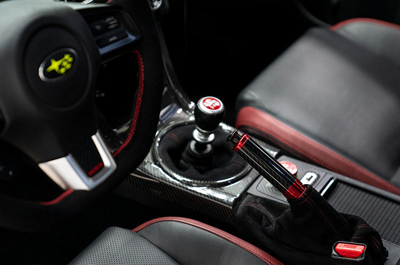 OLM Signature Series Ebrake Handle (Black Carbon w/Red) - 2015-2021 WRX & STI / 2013-2022 FR-S / BRZ / 86 / 2014-2018 Forester / 2013+ *Crosstrek