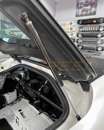 Rexpeed -  Supra GR 2020+ Carbon Fiber Rear Trunk Gas Strut Dampers