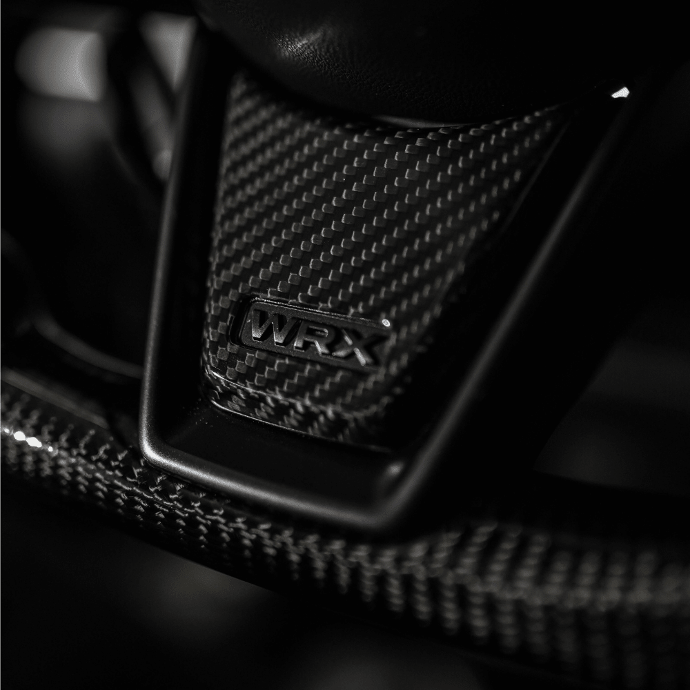 JDMuscle [22-26 WRX] Tanso Carbon Fiber Steering Wheel Lower Trim Cover